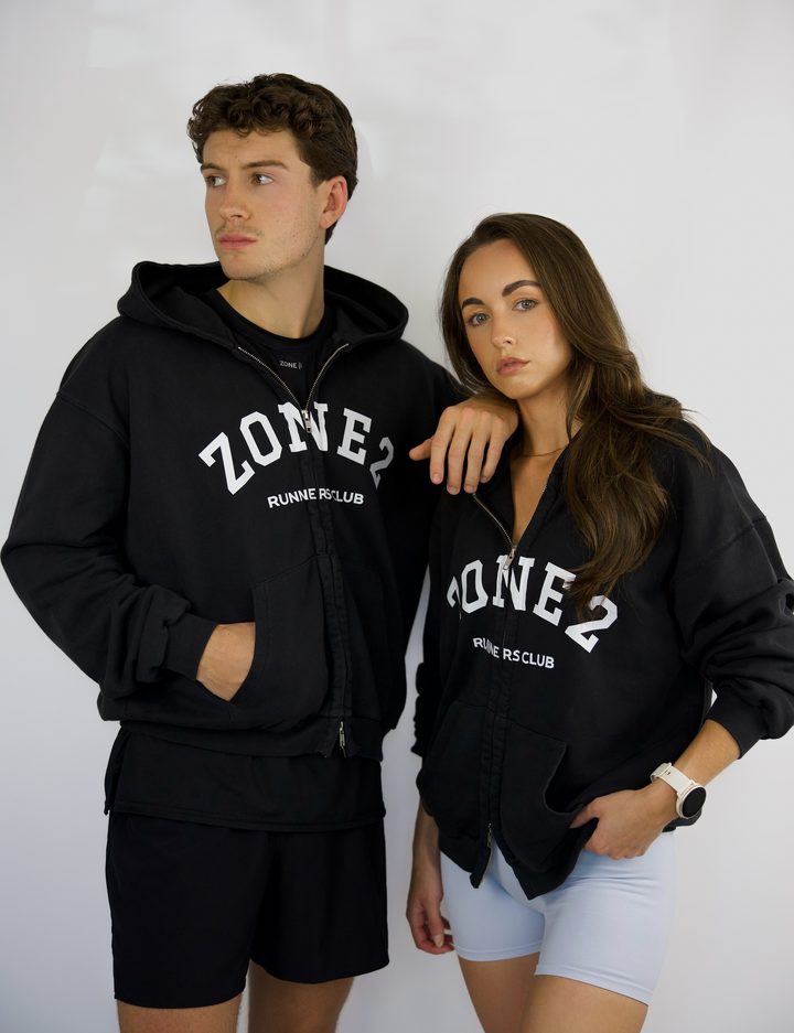 Two runners wearing the Zone 2 hoodie