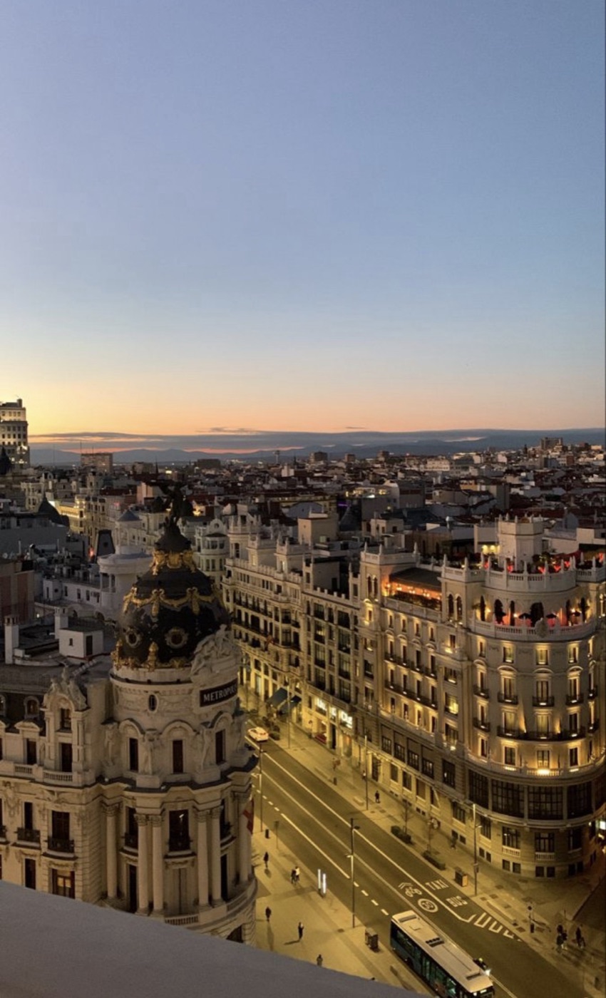 Gran Via and the Metropolis building in Madrid at dusk